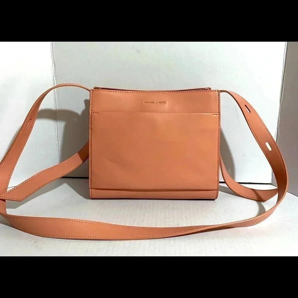 Charles & Keith pink poly crossbody handbag